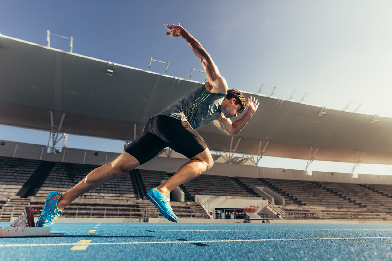 Sprinter Taking off from Starting Block 